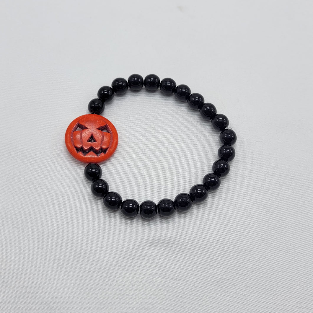 Black Druk Bead Bracelet with Pumpkin