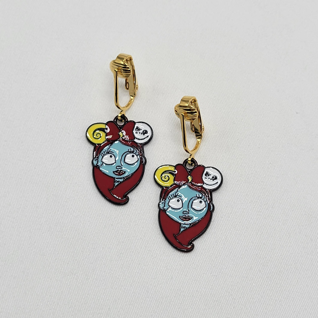 Stitched Girl Clip On Earrings